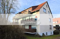 Heise Immobilien - 6-Familienwohnhaus mit Garagen - Delligsen