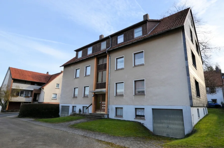 Heise Immobilien - 6-Familienwohnhaus mit Garagen - Delligsen