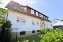 Eigentumswohnung mit Gartenanteil Balkon und Garage - Heise Immobilien