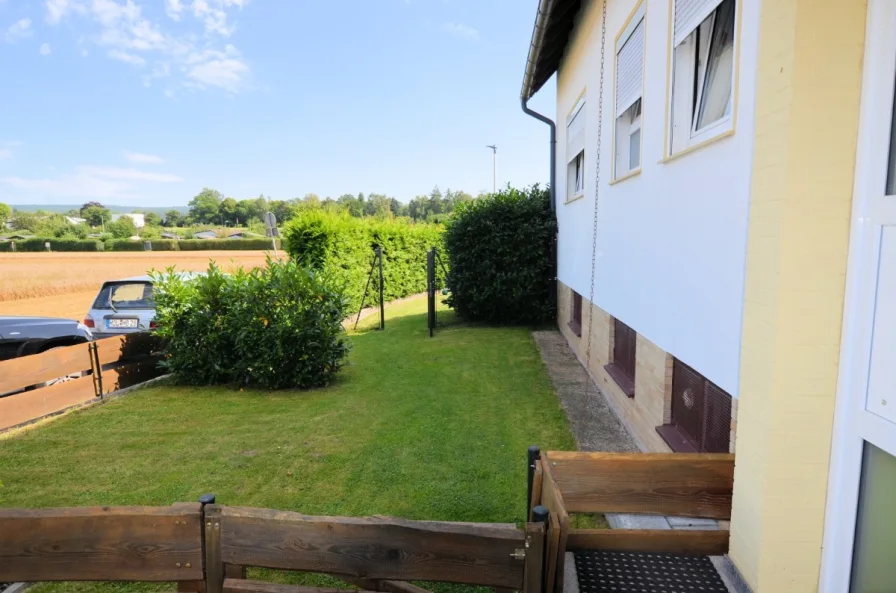 Eigentumswohnung mit Gartenanteil Balkon und Garage - Heise Immobilien