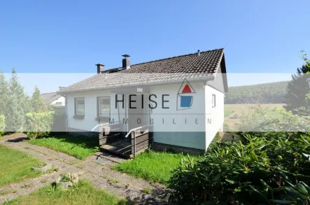 1-Familienwohnhaus mit Garage - Hellental - Solling - Haus kaufen in Heinade - 1-Familienwohnhaus mit Garage und unverbauter Sicht in den Solling - Hellental