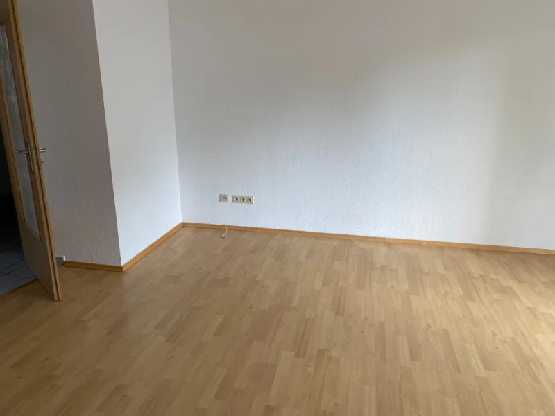 Wohnzimmer - www.immobilien-heise.de