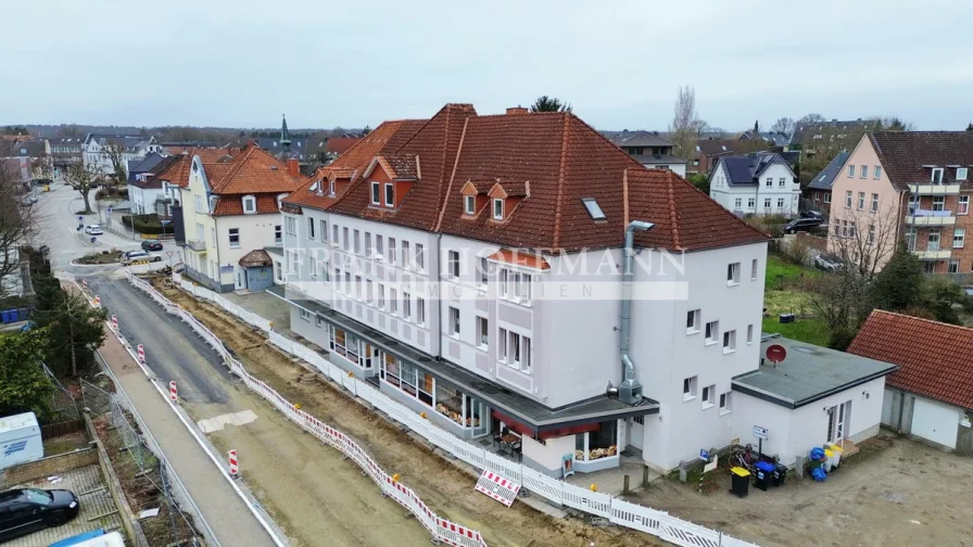Außenansicht 1 - Zinshaus/Renditeobjekt kaufen in Reinfeld - Gepflegtes Wohn-/Geschäftshaus mit Potenzial in zentraler Lage von Reinfeld