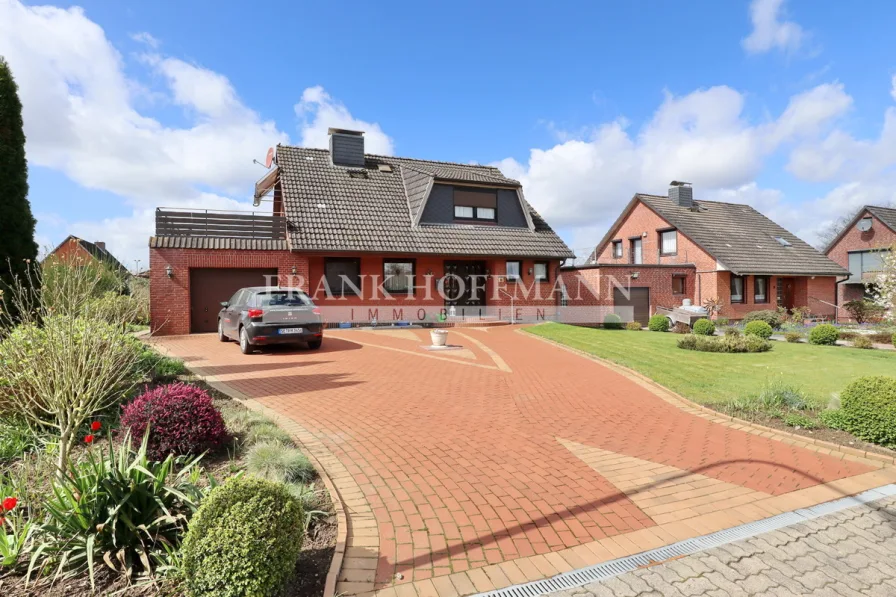 Frontansicht - Haus kaufen in Hohenaspe - Sehr gepflegtes und solides Wohnhaus mit Vollkeller und Garage in Hohenaspe