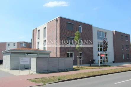 Aussenfoto mit Fahrradunterstand - Wohnung mieten in Kaltenkirchen - Terrassenwohnung - barrierefrei -  3 Zimmer - PERFEKT in Kaltenkirchen