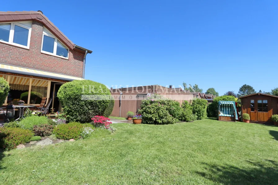 Garten - Haus kaufen in Henstedt-Ulzburg - Schönes Endreihenhaus mit Garage und Keller in begehrter Lage von Henstedt-Ulzburg