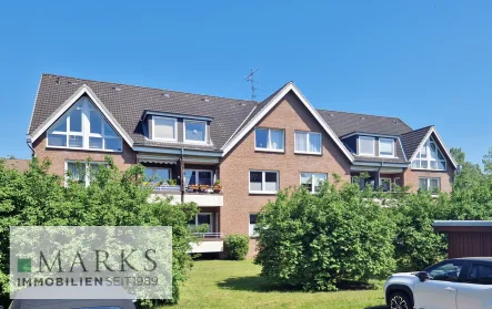 rückwärtige Ansicht - Haus kaufen in Stockelsdorf - Verkauf von 6 gepflegten 3-Zi.-Wohnungen in ruhiger und zentraler Lage - Erbbaurecht -