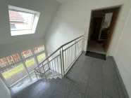 Treppenhaus mit Zugang WE13