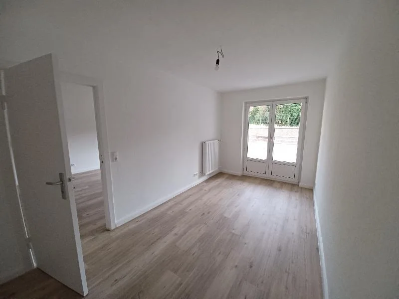 Schlafzimmer mit Balkon