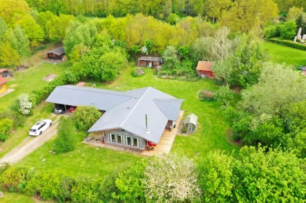 Wohnhaus - Haus kaufen in Frestedt - Holzhaus in Bungalowform mit einem ca. 3200 m² großen Grundstück