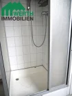 Dusche im Badezimmer OG