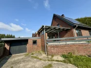 Garage und Terrasse