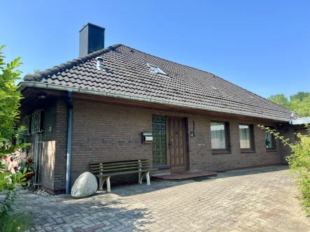 Willkommen - Haus kaufen in Mildstedt - Vielseitiger Winkelbungalow mit Ausbaureserve auf parkähnlichem Grundstück vor den Toren Husums