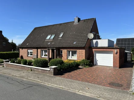 Vorderansicht - Haus kaufen in Nindorf - Für die große Familie - Einfamilienhaus mit schönem Garten in ruhiger Lage