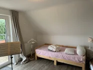 Schlafzimmer mit Balkon