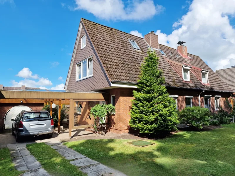 DHH - Haus kaufen in Heide - sofort verfügbar - DHH in Heide mit überdachter Terrasse und Balkon