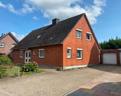 Blick aufs Haus - Haus kaufen in Heide - Gepflegtes, familiengerechtes Einfamilienhaus in bevorzugter Wohnlage