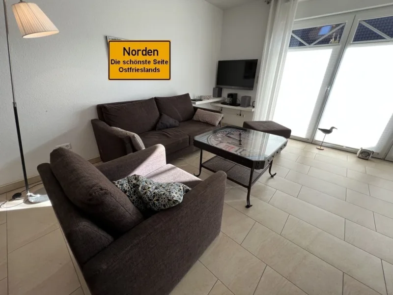 7880 Titelbild - Wohnung kaufen in Norden - Attraktive EG-Wohnung mit teilüberdachter Terrasse in bester Lage von Norden in Richtung Norddeich!