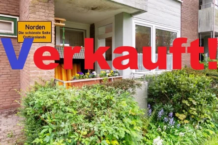 7892 Titelbild m. Ortsschild verkauft - Wohnung kaufen in Norden - Vermietete Erdgeschoss-Seniorenwohnung inmitten eines Altenwohnzentrums in beliebter Lage von Norden