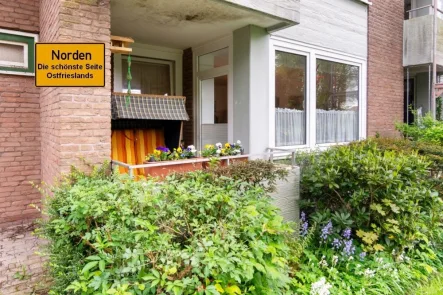 7892 Titelbild m. Ortsschild - Wohnung kaufen in Norden - Vermietete Erdgeschoss-Seniorenwohnung inmitten eines Altenwohnzentrums in beliebter Lage von Norden