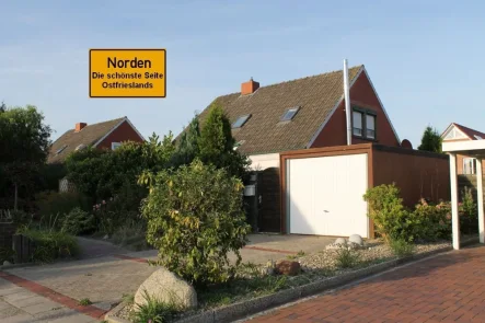 7922 Titelbild mit Ortsschild - Haus mieten in Norden - Schön aufgeteiltes Einfamilienhaus in ruhiger Sackgassenlage von Norden !