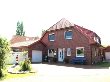 Hauptfoto, Rudolf-Kinau-Str 9a - Haus kaufen in Butjadingen - Sehr gepflegte Doppelhaushälfte an der Nordsee - Provisionsfrei für den Käufer
