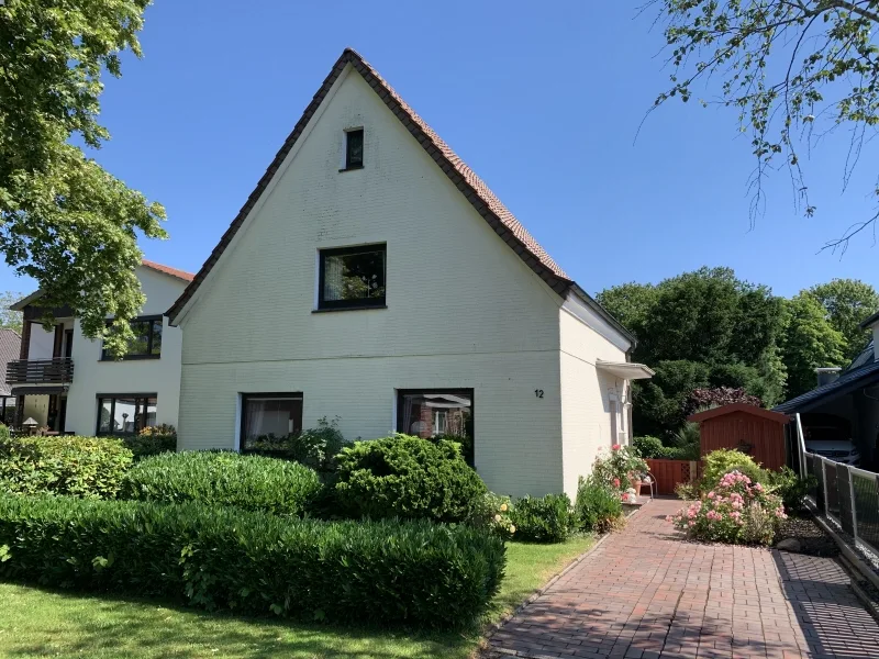 Vorderansicht - Haus kaufen in Nordenham - EFH mit wunderschönem Grundstück direkt an den Gateteichen