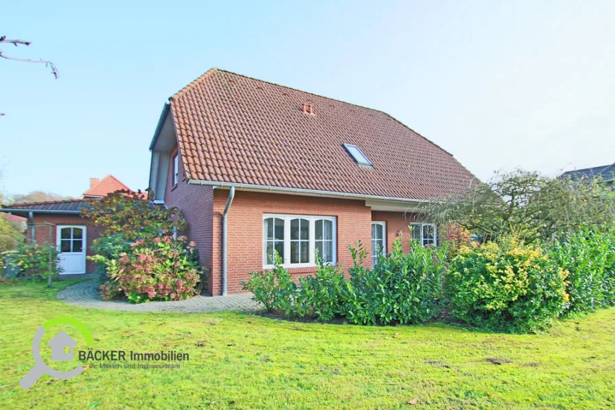 Ansicht vom Garten - Haus kaufen in Lemförde - Tolles ZFH mit Garage und großem Grundstück in Lemförde zu verkaufen.