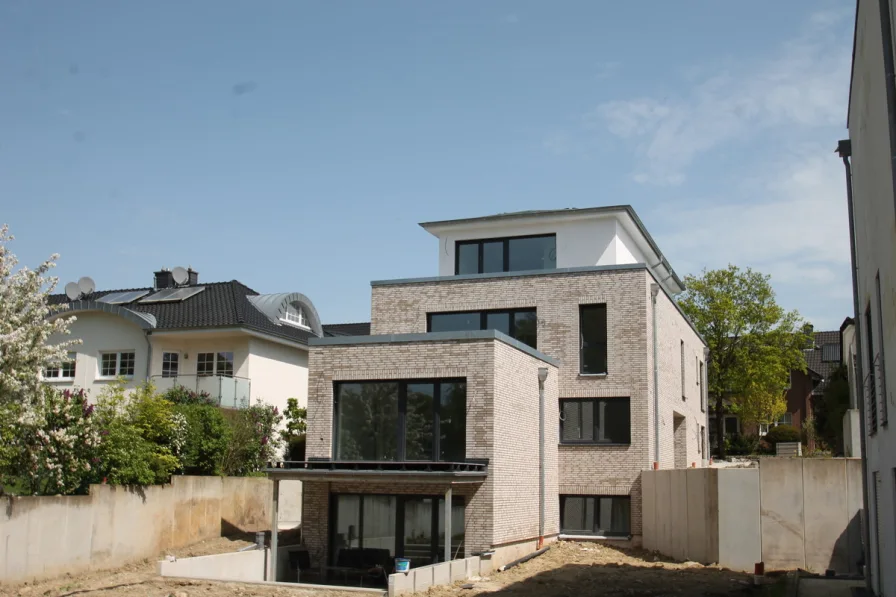 Gartenansicht - Wohnung kaufen in Osnabrück - Neubau-ETW in wunderschöner Villenlage