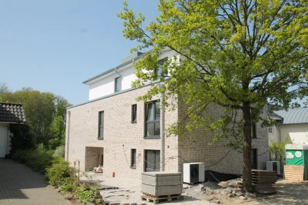 Hauseingang - Wohnung kaufen in Osnabrück - Kleine feine Penthouse-ETW mit tollem Blick ins Grüne