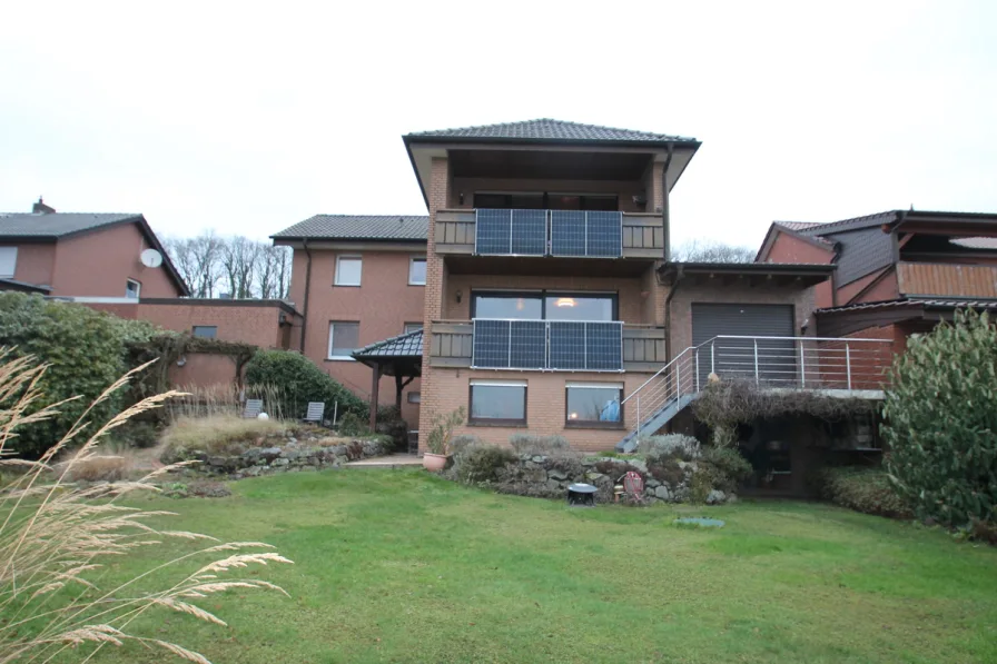 Gartenansicht - Haus kaufen in Westerkappeln - Tolles Familienhaus mit sonnigem Garten und Fernblick in Randlage von Westerkappeln