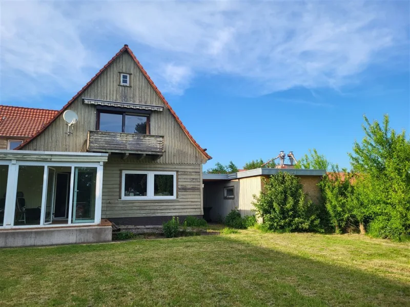 Gartenansicht - Haus kaufen in Wulften , Harz - *Freistehendes Einfamiliehaus mit Garten und Garage auf dem Land*