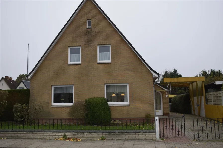 Straßenansicht - Haus kaufen in Otterndorf , Niederelbe - Bezahlbares Wohnhaus in ruhiger Lage