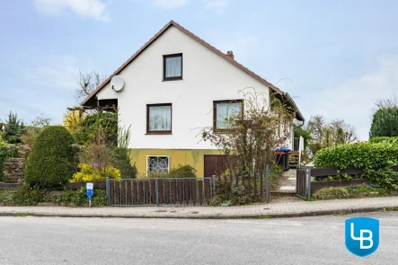 Straßenansicht - Haus kaufen in Malente - Charmantes Einfamilienhaus mit großem Garten und Potenzial