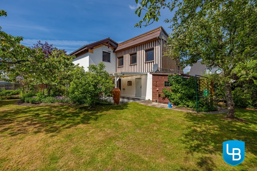 Blick zur Terrasse - Haus kaufen in Ascheberg (Holstein) - Charmantes Einfamilienhaus mit Garten – Perfekt für eine kleine Familie mit Kind