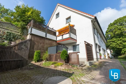 Außenansicht - Haus kaufen in Plön - Modernisiertes Reihenendhaus mit pflegeleichtem Außenbereich