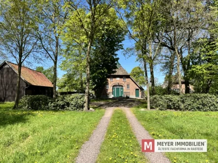 Objektansicht - Haus kaufen in Elsfleth / Butteldorf - Reetdachanwesen vor den Toren Oldenburgs für Natur- und Pferdeliebhaber mit zwei Wohneinheiten (Obj.-Nr.: 6178)