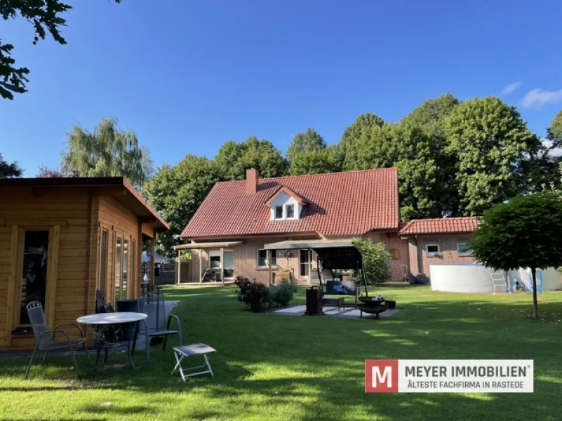 Ansicht - Haus kaufen in Surwold - Modernes Einfamilienhaus mit Einliegerwohnung und  der Möglichkeit des Zukaufes angrenzender Acker/Grünlandfläche (Obj.-Nr.: 6220)