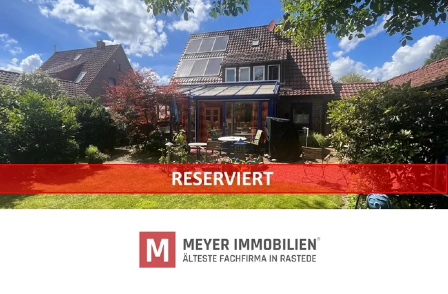 Meyer Immobilien - Haus kaufen in Rastede - Zweifamilienhaus mit Wintergarten und großem Gartengrundstück Nähe Schloßpark in Rastede (Objekt-Nr.: 6423)