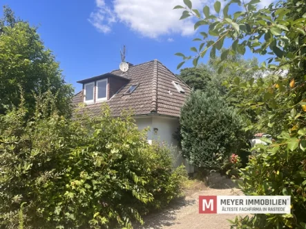 Objektansicht - Haus kaufen in Jade - Bezugsfreies Wohnhaus auf idyllischem Gartengrundstück in Schweiburg (Obj.-Nr.: 6419)