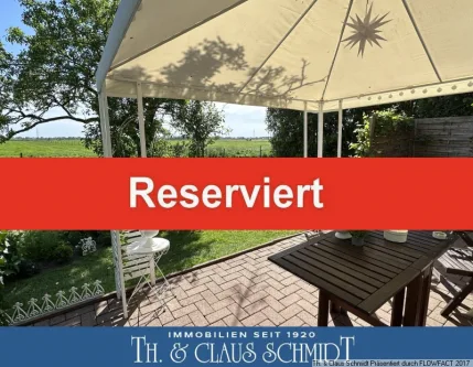 Terrasse Bungalow - Haus kaufen in Berne - ***Reserviert*** Vorne die Weser, hinten der Doorgraben! Kleines EFH am Weserdeich