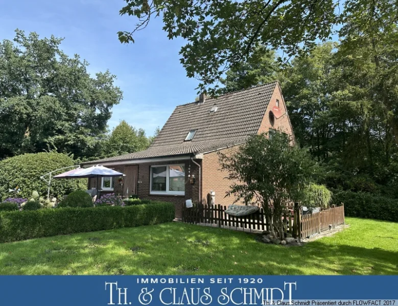 Ansicht mit Logo - Haus kaufen in Rastede - Ländliches Wohnhaus mit gr. Grundstück, freiem Wiesenblick und umfangreichen Möglichkeiten