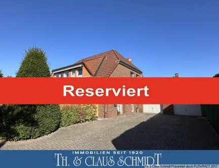 Ansicht des 2-Familienhauses - Wohnung kaufen in Rastede - ***Reserviert*** 3 Zi.- Oberwohnung mit Balkon, Garage & eigenem Gartenanteil in guter Lage von Rastede