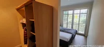 Schlafzimmer mit Ankleidebereich