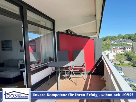 12903 LooseImmo Titelbild Logo - Wohnung kaufen in Grömitz - Feriendomizil 1,5-Zi. Wohnung mit Teilseeblick in Grömitz.