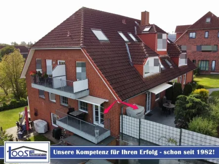 22897 LooseImmo Titel mit Logo - Wohnung kaufen in Timmendorfer Strand - Moderne Ferienwohnung mit großzügiger Terrasse – Ihr idealer Rückzugsort für entspannte Tage!