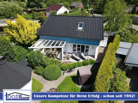 14326 LooseImmo Titelbild - Haus kaufen in Timmendorfer Strand / Niendorf - Traumhaftes Ferienhaus mit Sauna in Niendorf - Aalbeek-Siedlung