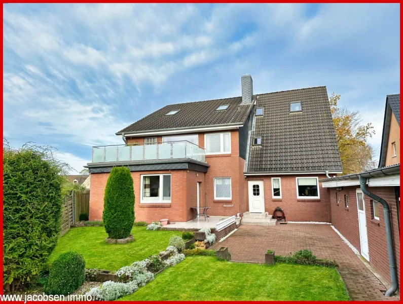 Südwestansicht - Haus kaufen in Schleswig - Ein beliebter Wohn-Trend im Zweifamilienhaus gemeinsam unter einem Dach