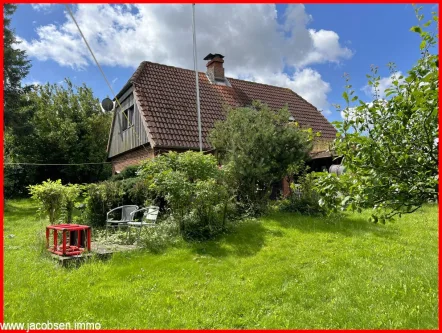 Ansicht vom Garten - Haus kaufen in Nieby - "Von Natur umgeben" - Traumhaft Wohnen nahe der Ostsee und demNaturpark "Geltinger Birk"