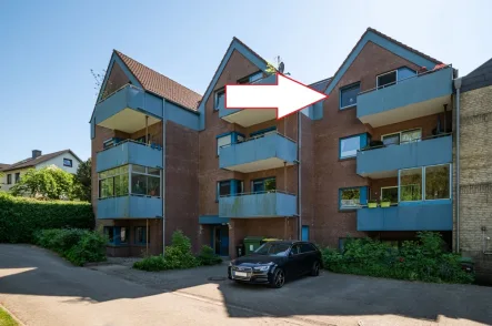 Ansicht vorne - Wohnung kaufen in Schleswig - 3-Zimmer-Dachgeschoss-Wohnung mit Blick zur Schlei